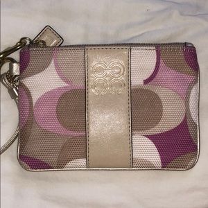 COACH wristlet with pink and cream detailing!